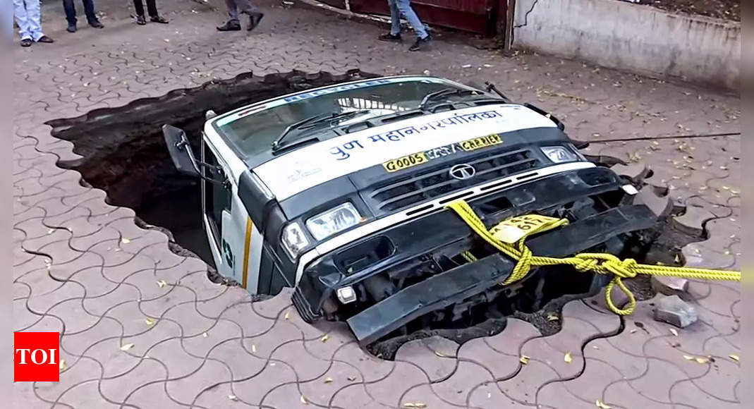 Video: Civic body’s truck falls into sinkhole at Pune’s city post office | India News