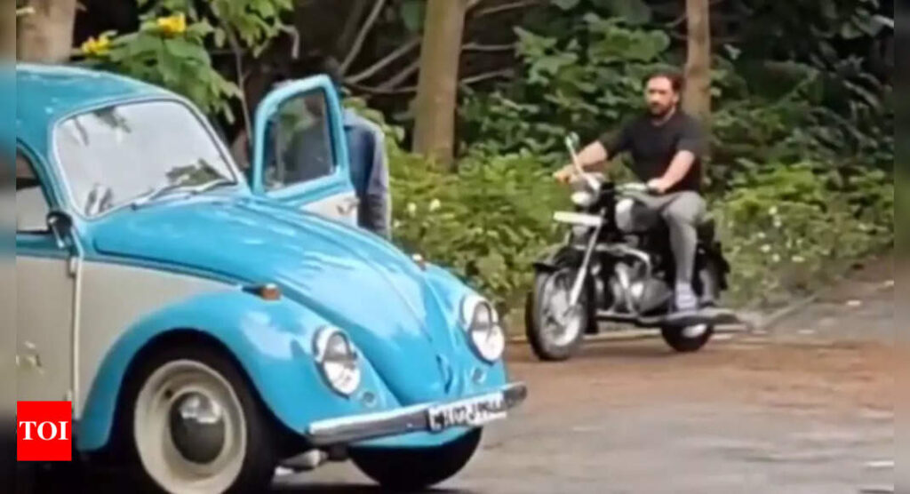 Viral video: Long-haired MS Dhoni spotted riding bike in slippers, taking u-turn in style